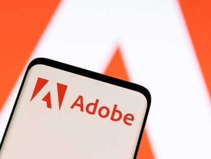Adobe logo is seen on smartphone in this illustration taken June 13, 2022.