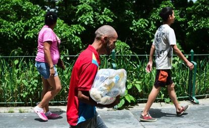 Venezuelans walking to a food distribution center in Caracas.