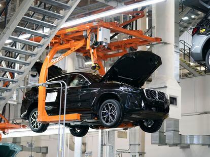 Cars move on the assembly line at the BMW Spartanburg plant in Greer, South Carolina, on October 19, 2022.