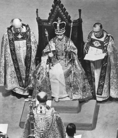 Elizabeth II just after being crowned at Westminster Abbey. The queen holds in her hands the sovereign's orb and the royal scepter.