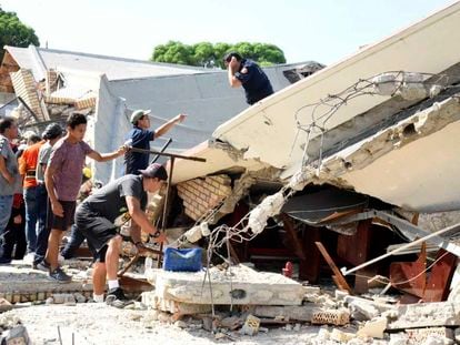 Rescue workers search for survivors amid debris after the roof of a church collapsed during a Sunday Mass in Ciudad Madero, Mexico, Sunday, Oct. 1, 2023.+