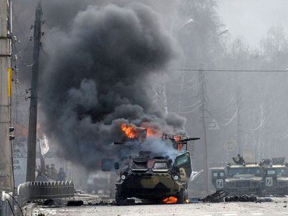 A Russian armed vehicle in flames in the Ukrainian city of Kharkiv.