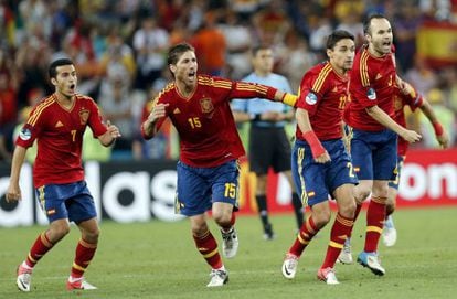 Sergio Ramos (center) leads teammates in the celebrations after Spain knocked out Portugal on penalties.