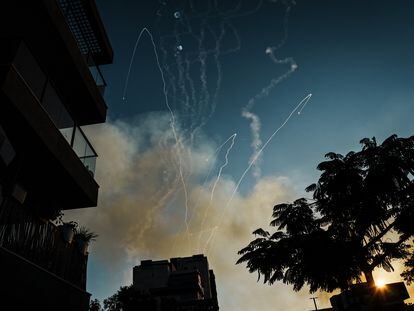 Hamas missiles are intercepted by the Israeli air defense system, known as the Iron Dome, over Ashkelon, October 10, 2023.
