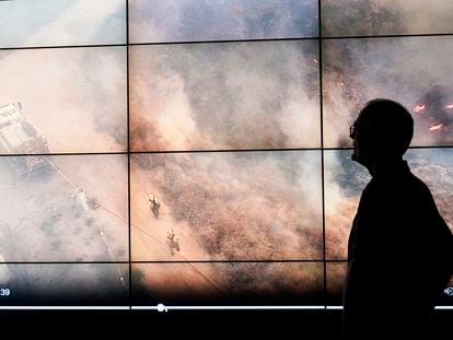 Falco Kuester, a researcher at ALERTCalifornia, a program run by the University of California San Diego, looks at imagery of firefighters at a fire from one of the program's cameras, Monday, Sept. 18, 2023.