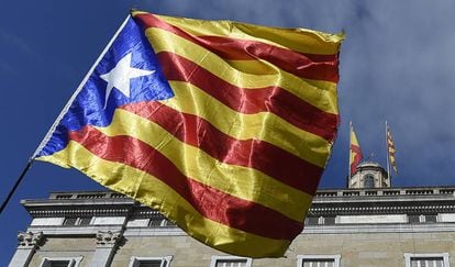 A Catalan pro-independence flag in front of the Catalan government headquarters.