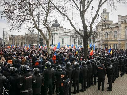 People gather during a protest initiated by the Movement for the People and members of Moldova's Russia-friendly Shor Party in Chisinau, Moldova, on February 28, 2023.