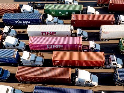 Trucks line up to enter a Port of Oakland shipping terminal on November 10, 2021, in Oakland, California.
