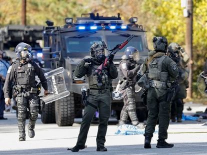Police officers gathered in response to demonstrators protesting at the construction site of the Atlanta Public Safety Training Center, known as Cop City, near Atlanta, Georgia, USA, November 13 2023.