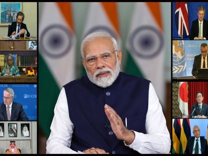 Indian Prime Minister Narendra Modi (C) and other leaders on a screen during the G20 virtual summit in New Delhi, India, November 22 2023.