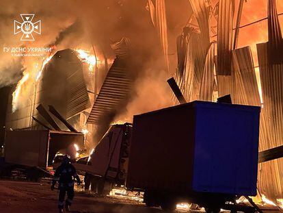 A handout photo made available by the State Emergency Service shows Ukrainian rescuers putting out a fire of industrial storage after shock drone debris fell on it, in the western Ukrainian city of Lviv, Ukraine, 19 September 2023.
