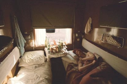 Bowie napping on the Trans-Siberian train after a party. It was 1973.