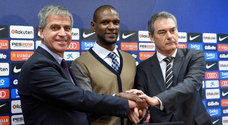 Éric Abidal (center) is introduced as Barça's new technical secretary.