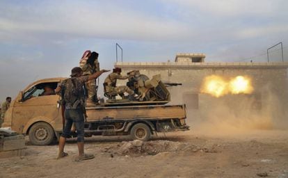 Syrian rebels supported by the Turkish army fight the Kurdish-led forces in Manbij, in the north of Syria.