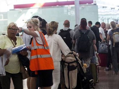 Staff at Barcelona airport direct passengers this week.