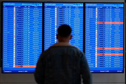 A flight board with delays and cancellations at Ronald Reagan Washington National Airport in Arlington, Va. on Wednesday.