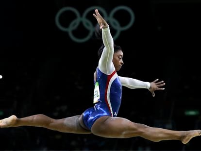 FILE - United States' Simone Biles performs on the balance beam during the artistic gymnastics women's individual all-around final at the 2016 Summer Olympics in Rio de Janeiro, Brazil, Aug. 11, 2016.forced her to remove herself from several events at the Tokyo Olympics. (AP Photo/Rebecca Blackwell, File)