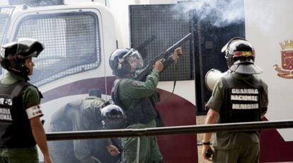 Members of Venezuela's Bolivarian National Guard fire tear gas at protestors during nationwide demonstrations last year.