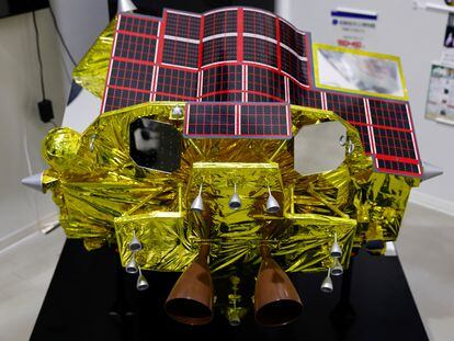 A miniature model of the Smart Lander for Investigating Moon (SLIM) is displayed at Japan Aerospace Exploration Agency (JAXA)'s facility in Sagamihara, Japan, January 19, 2024.