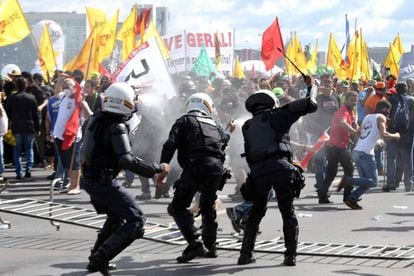 The march turned violent when small groups of anarchists attacked police.