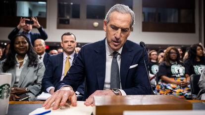 Former Starbucks CEO Howard Schultz prepares to testify before the Senate Health, Education, Labor, and Pensions Committee on March 29, 2023.