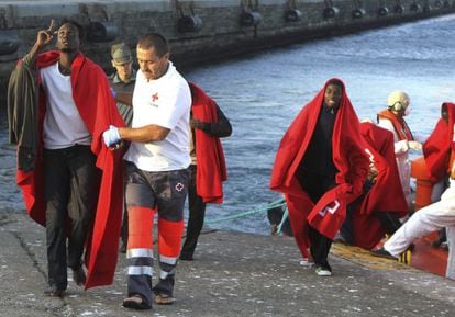 Immigrants arriving in Spain at Tarifa, Andalusia in the care of the Red Cross.