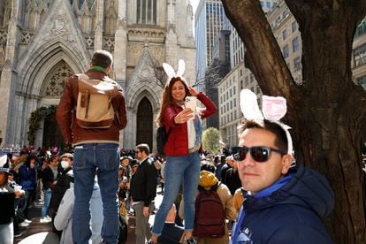 A woman takes a selfie during the New York Easter Parade, on April 17, 2022 in New York City.