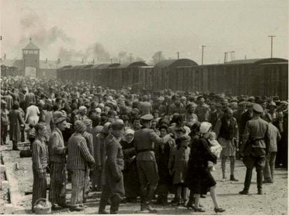 Entrance to the Auschwitz-Birkenau camp, in the summer of 1944.
