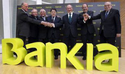 Rato (center) was also head of Bankia, which had to be nationalized in 2012.