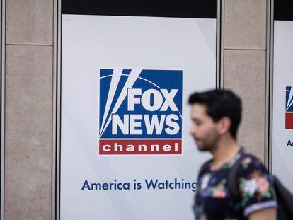 A person walks past the Fox News Headquarters in New York, April. 12, 2023.