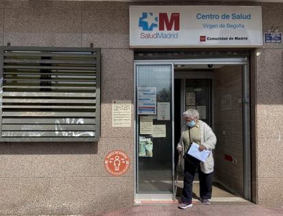 A woman leaving a primary healthcare center in Madrid.