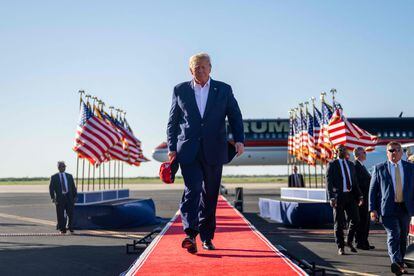Former U.S. President Donald Trump arrives during a rally at the Waco Regional Airport on March 25, 2023