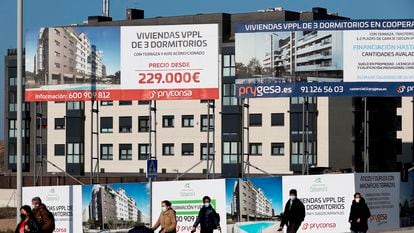 Signs announcing new housing developments in Madrid in October 2021.