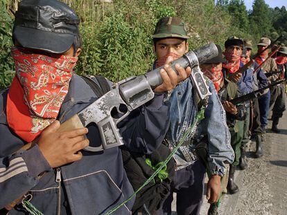 Guerrillas of the Zapatista Army of National Liberation establish a roadblock near San Cristóbal de las Casas, on January 3, 1994.