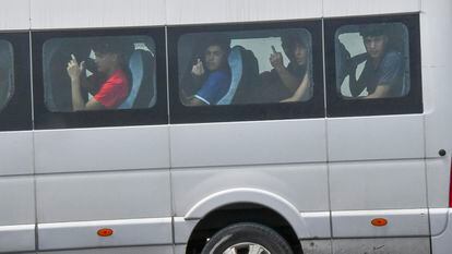 Migrant minors on a bus to be deported from Ceuta.