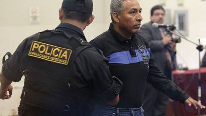 Shining Path leader &quot;Artemio&quot; is escorted to a military courtroom last December. 