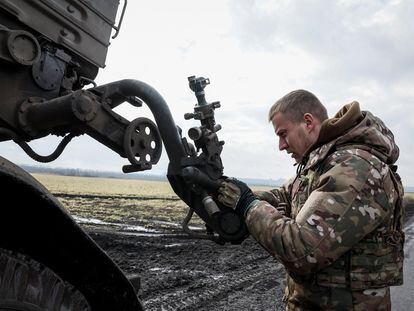 A Ukrainian soldier prepares to fire at Russian positions on the front line in the Donetsk region on February 4.