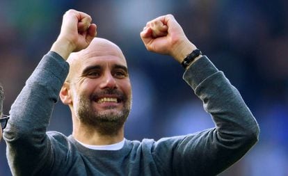 Pep Guardiola celebrates Manchester City winning its second Premier League in a row.