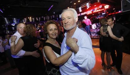 Senior citizens dancing the evening away at Madrid's La Rosa ballroom.