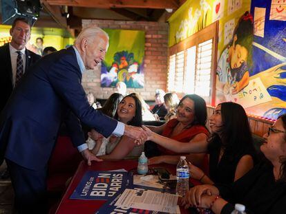 U.S. President Joe Biden greets his supporters during a campaign event at a Mexican restaurant in the Phoenix area, Arizona, U.S., March 19, 2024.