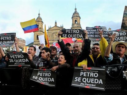 Supporters of Bogota mayor Gustavo Petro protest against his dismissal. 