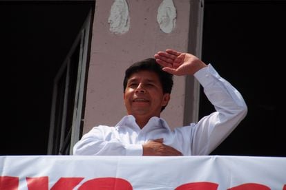 Pedro Castillo greets supporters in the Dos de Mayo plaza in Lima, Peru, on May 1, 2021, during his presidential campaign.