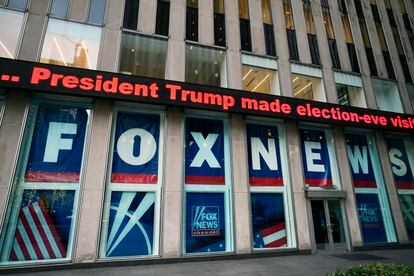 A headline about President Donald Trump is displayed outside Fox News studios in New York