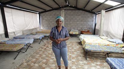 Carmen Carcelén in one of the rooms of her house that shelters migrants from Venezuela.