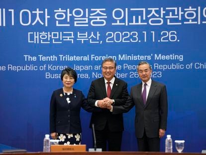 Chinese Foreign Minister Wang Yi, right, South Korean Foreign Minister Park Jin, center, and Japanese Foreign Minister Yoko Kamikawa