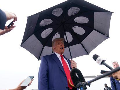 Former President Donald Trump speaks before he boards his plane at Ronald Reagan Washington National Airport, Thursday, Aug. 3, 2023, in Arlington, Va., after facing a judge on federal conspiracy charges that allege he conspired to subvert the 2020 election.