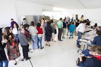 Voters lining up at a polling station in Santiago de Compostela.