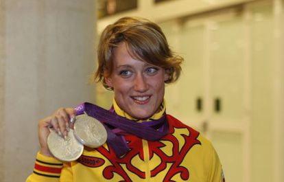 Mireia Belmonte shows off her silver medals at the London Olympics.