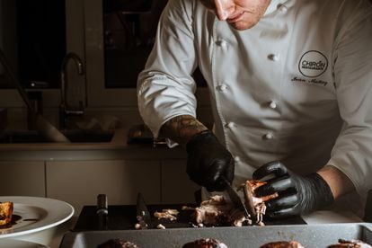 A chef from Take a Chef working in a client’s kitchen. Image provided by the company.