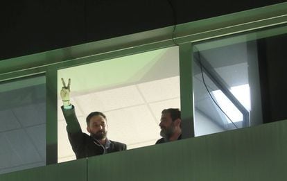 Vox leader Santiago Abascal greets supporters and the press from a window at the party’s headquarters in Madrid.
